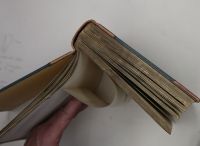 compton leather showing stiff paper folded across grain
